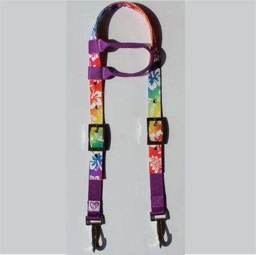 A colorful floral-patterned headstall with purple webbing and metal clips, .