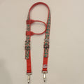 Red and green cookie pattern horse headstall with silver metal buckles and 