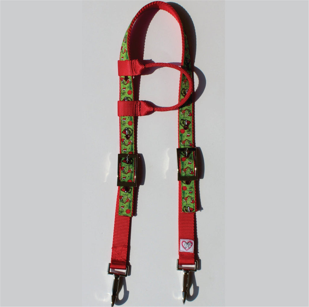 A red horse headstall with grump webbing and metal hardware.