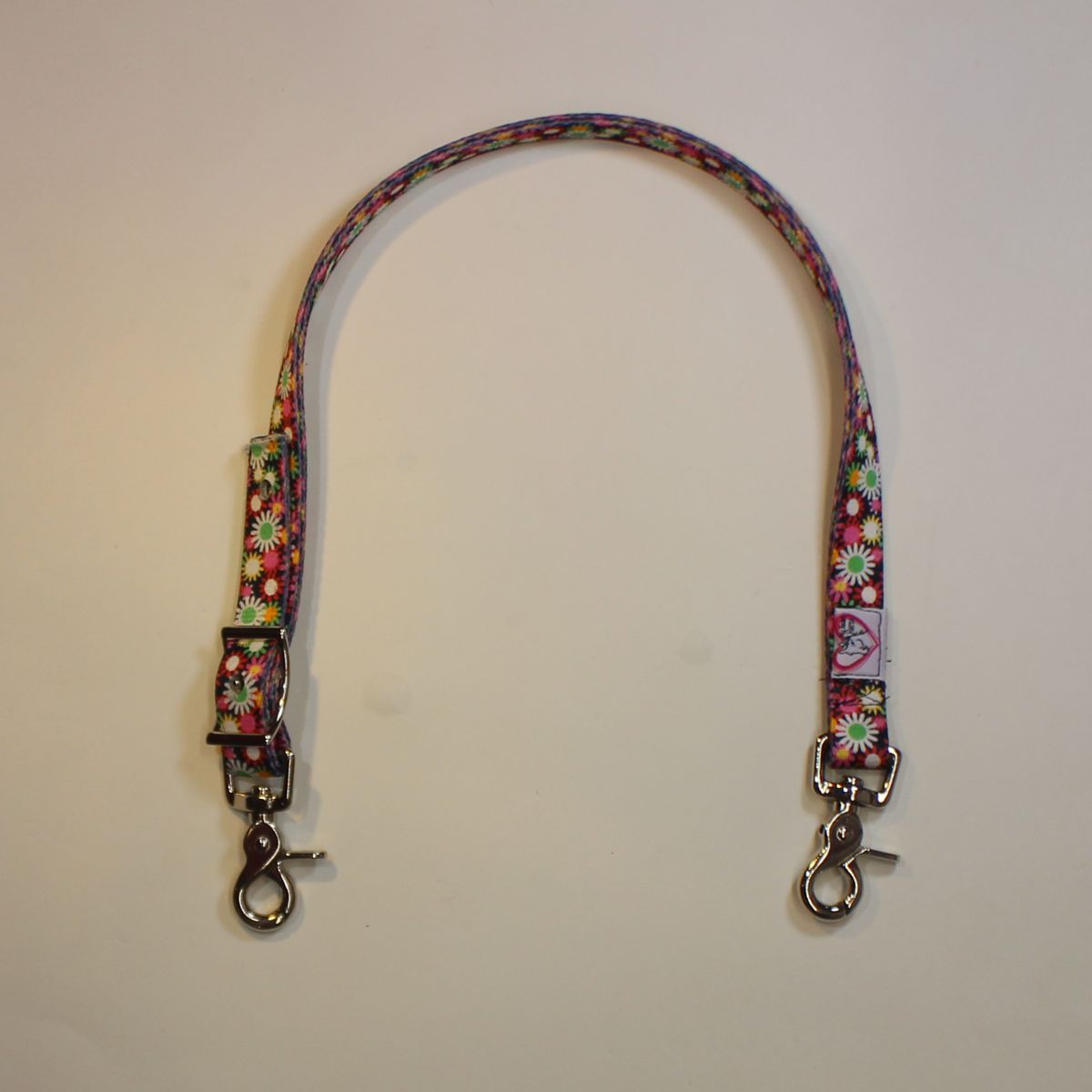 Flower power wither strap for a saddle