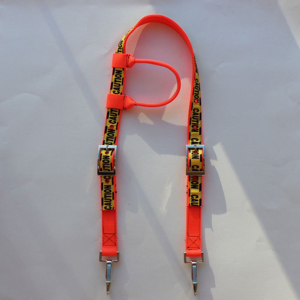 Bright orange safety horse headstall with yellow and black caution tape printed straps and silver metal clips